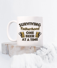 Load image into Gallery viewer, Surviving Fatherhood Funny White Coffee Mug, Father&#39;s Day, Birthday Gifts
