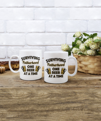 Load image into Gallery viewer, Surviving Fatherhood Funny White Coffee Mug, Father&#39;s Day, Birthday Gifts
